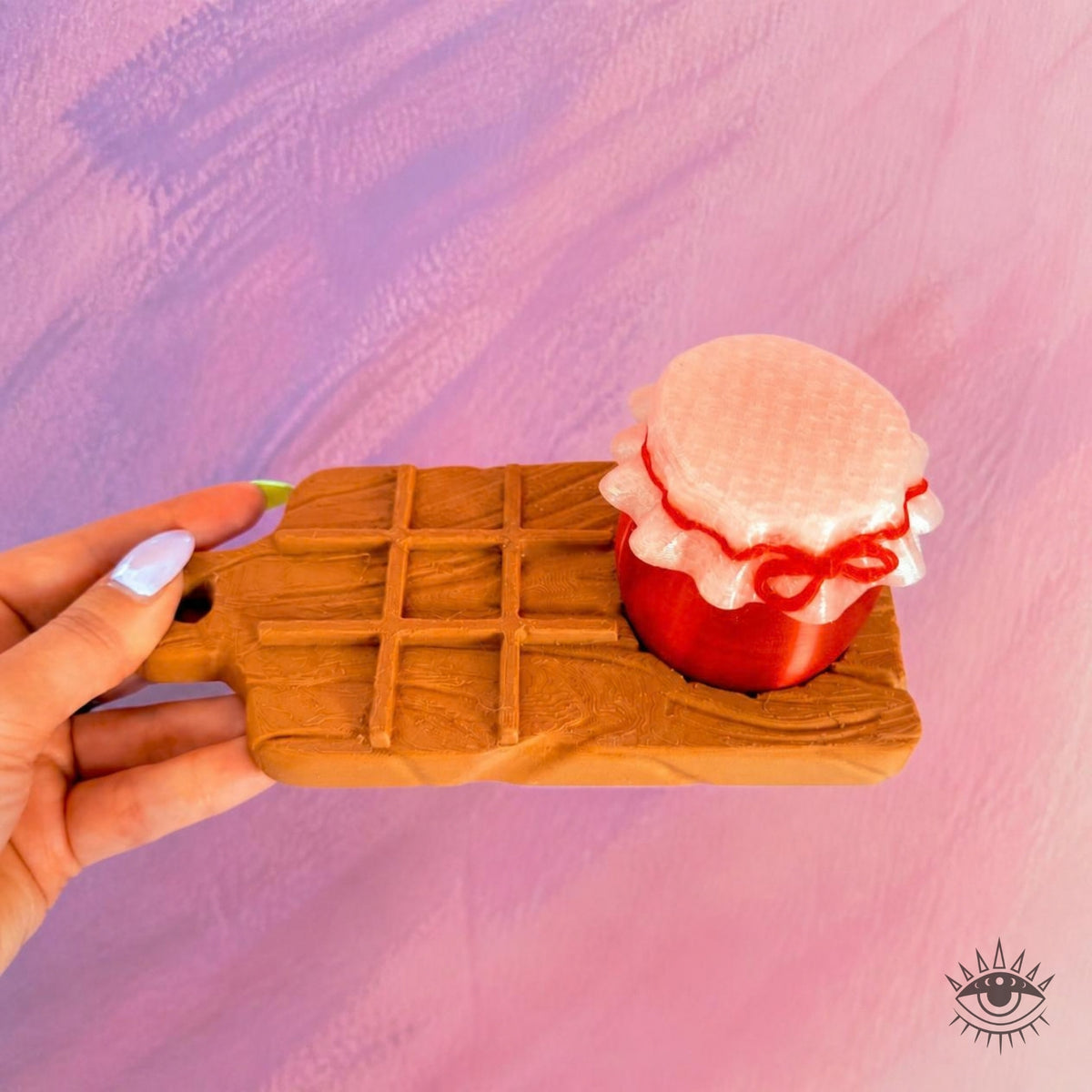 Hand holding Charcuterie Tic Tac Toe board